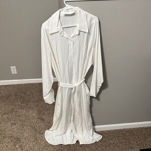 ASO on Meghan Markle Stylish White Button-Up Dress with Belt